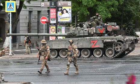 Armed men in a street near the headquarters of the Southern Military District in Rostov-on-Don, Russia. Wagner boss Yevgeny Prigozhin claims to have seized control of the city’s military sites.