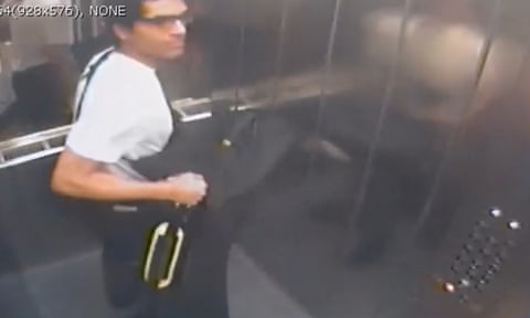 Image from CCTV footage showing Nicholas Prosper carrying a shotgun in a large holdall. tidttiqzqiqkdprw qhiukiqrihtinv