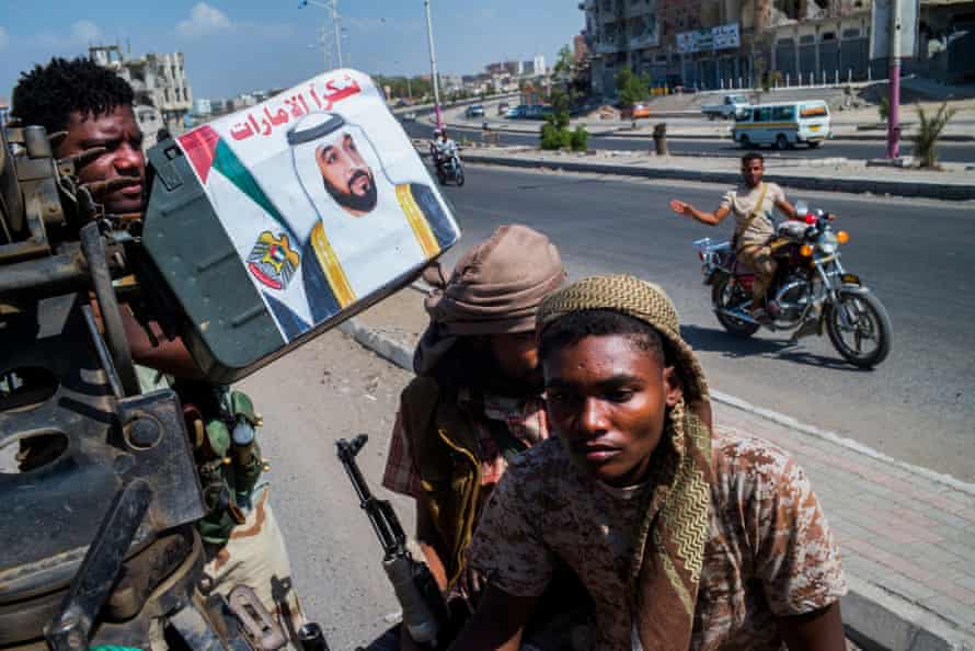 Pro goverment resistance fighters patroling the streets in Aden. their machine guns emblazoned with the picture of the ruker of the UAE. with absence of state institutins militias have become de facto rulers of the city. By Ghaith Abdulahad