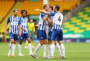 Brighton and Hove Albion’s Shane Duffy (right) celebrates victory with teammates.