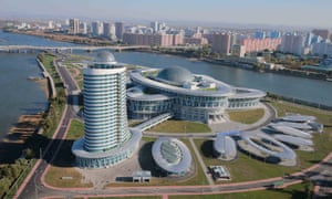 The Ssuk islet in the Taedong River, with a view of the <br>Sci-Tech Complex.