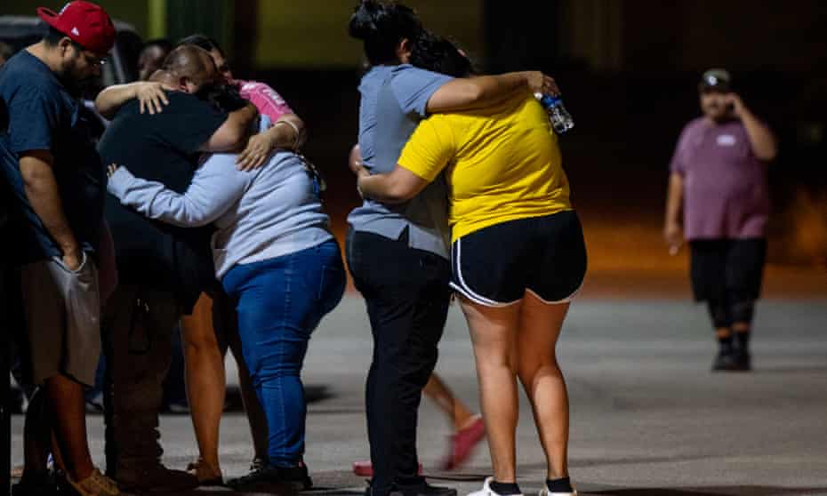 Mourners outside the local civic centre after the mass shooting at Robb Elementary School in Uvalde, Texas.  
