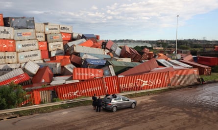 Hundreds of shipping containers washed away by flood waters near Durban