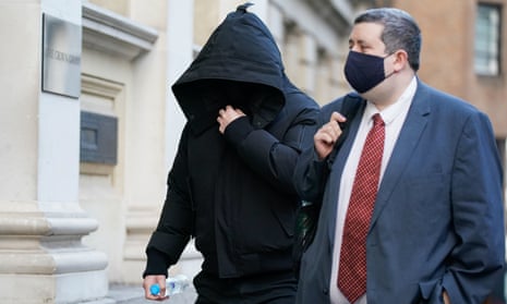 A person understood to be Nathan Smith, left, accompanied by a member of his legal team, arrives at Bristol crown court