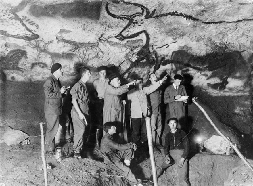 Archaeologist Henri Breuil, third from left at back, in Lascaux cave in 1948.