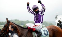 Frankie Dettori celebrates his Oaks victory on Snowfall.