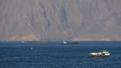 Ships and tankers in the strait of Hormuz off the coast of Musandam, Oman.