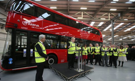 Boris Johnson in front of one of London’s revived Routemaster buses, ordered while he was mayor of London, during a visit to the Wrightbus factory. 