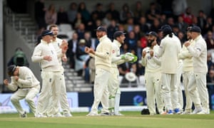 England celebrate the wicket of Rohit Sharma