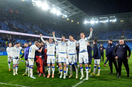 Kosovo celebrate after their victory in the World Cup playoff against Slovakia.