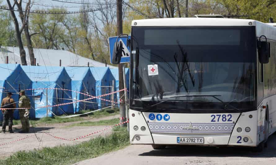 A bus for transporting evacuees, at a temporary accommodation centre in Bezimenne, Ukraine
