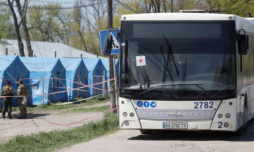 A bus transporting evacuees, including civilians who left the area near Azovstal steel plant in Mariupol, is seen near a temporary accommodation centre in the village of Bezimenne in the Donetsk region of Ukraine