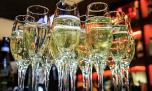 A tray of glasses filled with champagne