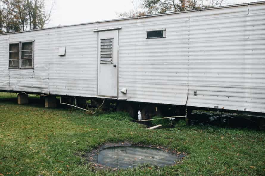 A mobile home using “straight pipe” sits a few feet away from a pool of raw sewage. Inadequate sewage treatment has plagued Alabama’s poor Black Belt community for decades, often leading to problems of overflow and contamination of the area’s water supply.