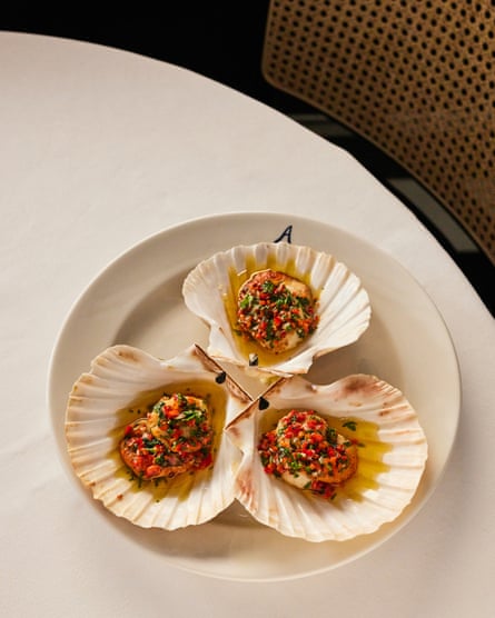 Seared scallops with chilli ‘backstroking in garlic butter’ at The Arlington, at London’s St James’s.