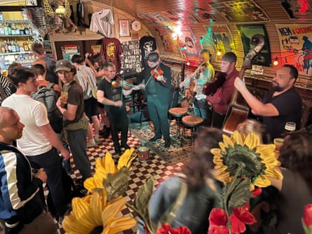 Bar with live music and giant sunflowers