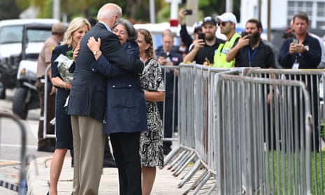 President Joe Biden hugs Miami-Dade County Mayor Daniella Levine Cava.