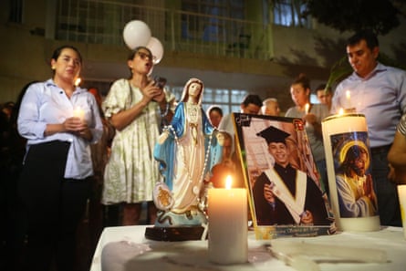 Friends and relatives in Colombia hold a vigil for Johan Sebastián Durán Guerrero, a Colombian national who was fatally shot by an Immigration and Customs Enforcement officer in Maine.