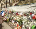 National Tributes For The Victims Of The Paris Terrorist Attacks<br>PARIS, FRANCE - NOVEMBER 27: People with the French Tricolore flag at the ‘Bataclan’ concert hall in memory of the 130 victims of the Paris terrorist attacks on November 27, 2015 in Paris, France. French President Francois Hollande called on all French citizens to hang the tricolore national flag from their windows to pay tribute to the victims of the terrorist attacks. (Photo by Patrick Aventurier/Getty Images)