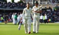 Alex Carey (left) and Josh Hazlewood leave the field after Australia lost the fifth Test against England at the Oval.