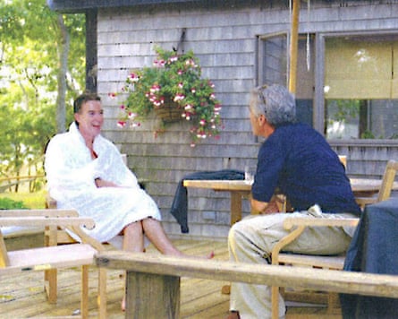 Peter Mandelson in a bathrobe sitting on a veranda and talking to Jeffrey Epstein