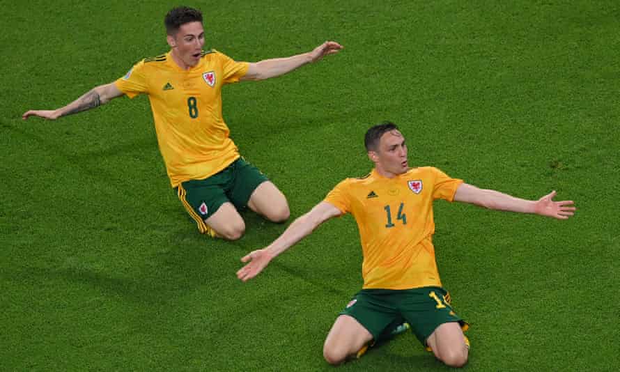 Connor Roberts celebrates with Harry Wilson after scoring Wales’ second goal