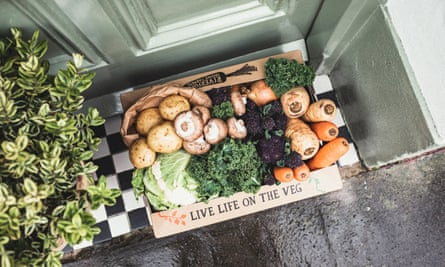A box of vegetables on a doorstep