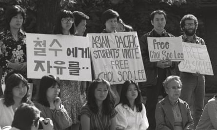 Demonstrators holding signs, campaigning for the release of Chol Soo Lee.