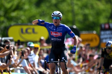 Jasper Philipsen (Alpecin-Deceuninck) celebrates victory in stage three.