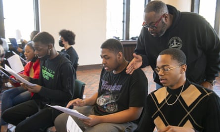 Artistic director Anthony White and young singers.