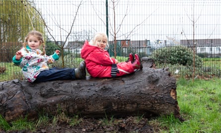 Children play outside Sprig Ludens nursery.