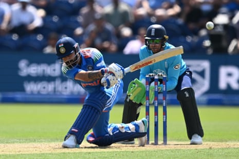 Virat Kohli thumps a boundary.