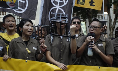 People march in support of the imprisoned pro-democracy leaders in Hong Kong.