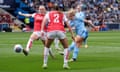 Manchester City's Lauren Hemp (right) scores the opening goal of the game.