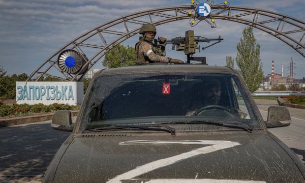 Russian servicemen on guard at the Zaporizhzhia nuclear power station in Enerhodar