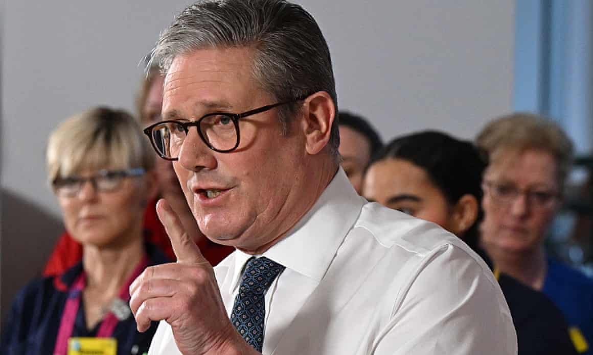 Starmer gestures as he speaks