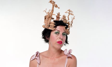 Isabella Blow in a hat shaped like a miniature Chinese garden