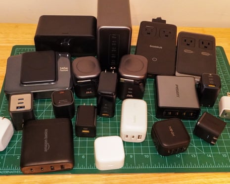 A group shot of various usb chargers on a table