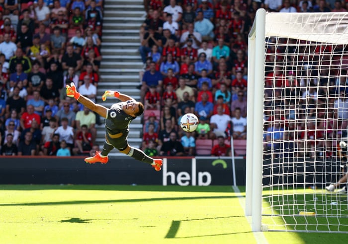Bournemouth’s Kieffer Moore heads in their second goal past Aston Villa’s keeper Emiliano Martinez.