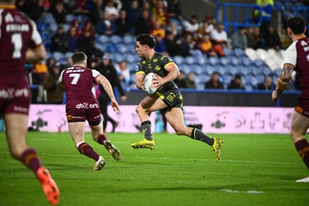 Brodie Croft of Leeds Rhinos successful action against Huddersfield Giants