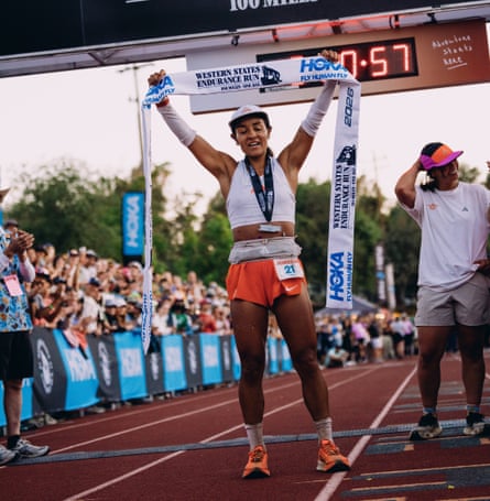 Jenn Lichter stands at the finish line of the Western States