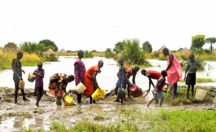 People try to block flood water from broken dykes on the Nile in South Sudan last September. ‘Destruction of our natural environment and other human rights failures have created enormous fragilities in our societies,’ said Guterres.