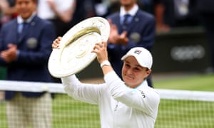 Ashleigh Barty lifts the Venus Rosewater Dish trophy after winning her Ladies’ Singles Final match against Karolina Pliskova.