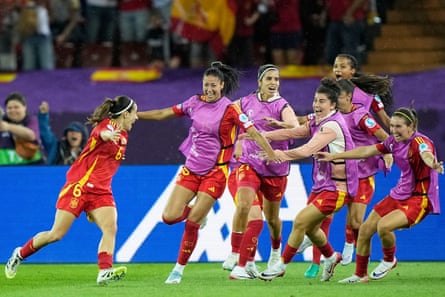 Aitana Bonmatí celebrates with her Spain teammates after scoring the semi-final winner.