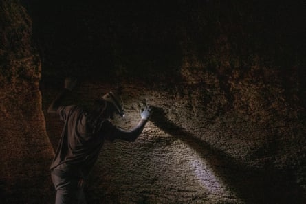 Chomela in a dark cave.