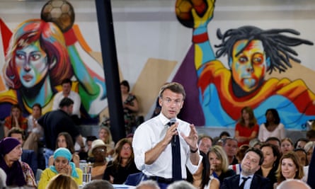 French president Emmanuel Macron speaks during a public meeting with residents in the Busserine district of Marseille on Friday.