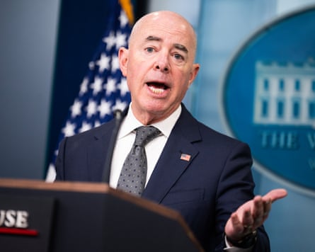 Man in suit at lectern