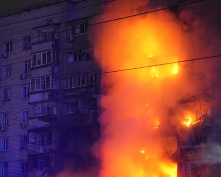 A fire burns at a residential building after a Russian attack in Vyshgorod, outside Kyiv