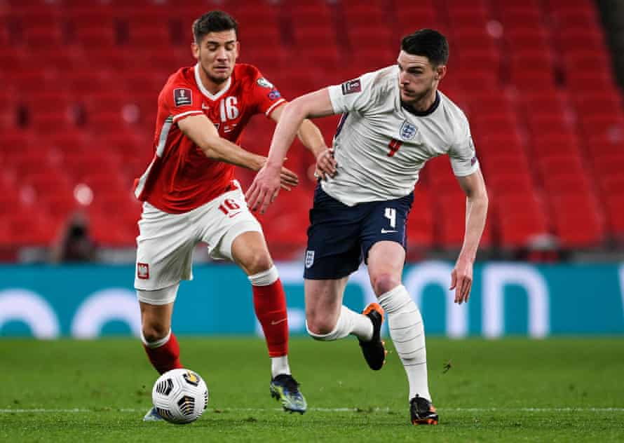 Declan Rice battling with Jakub Moder of Poland.