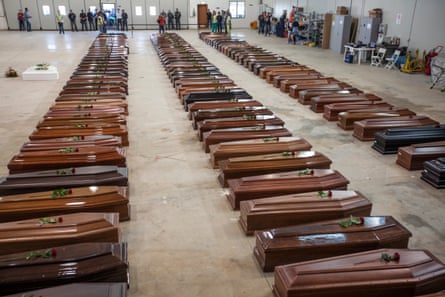 The coffins of the shipwrecked of the 3 October 2013 at the hangar of the airport of Lampedusa